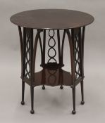 An early 20th century mahogany side table and two caned chairs.