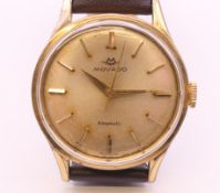 A Movado gold plated stainless steel Kingmatic automatic wristwatch, ref 55179,