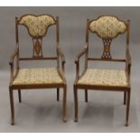 Two Edwardian inlaid open armchairs. Each approximately 49 cm wide.