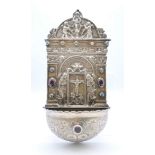 A Continental silver hanging font set with cabochon stones. 19 cm high, 10 cm wide. 135.