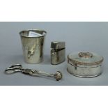 A 900 silver beaker, a pair of sugar tongs, a coin set plated box and a travelling inkwell.