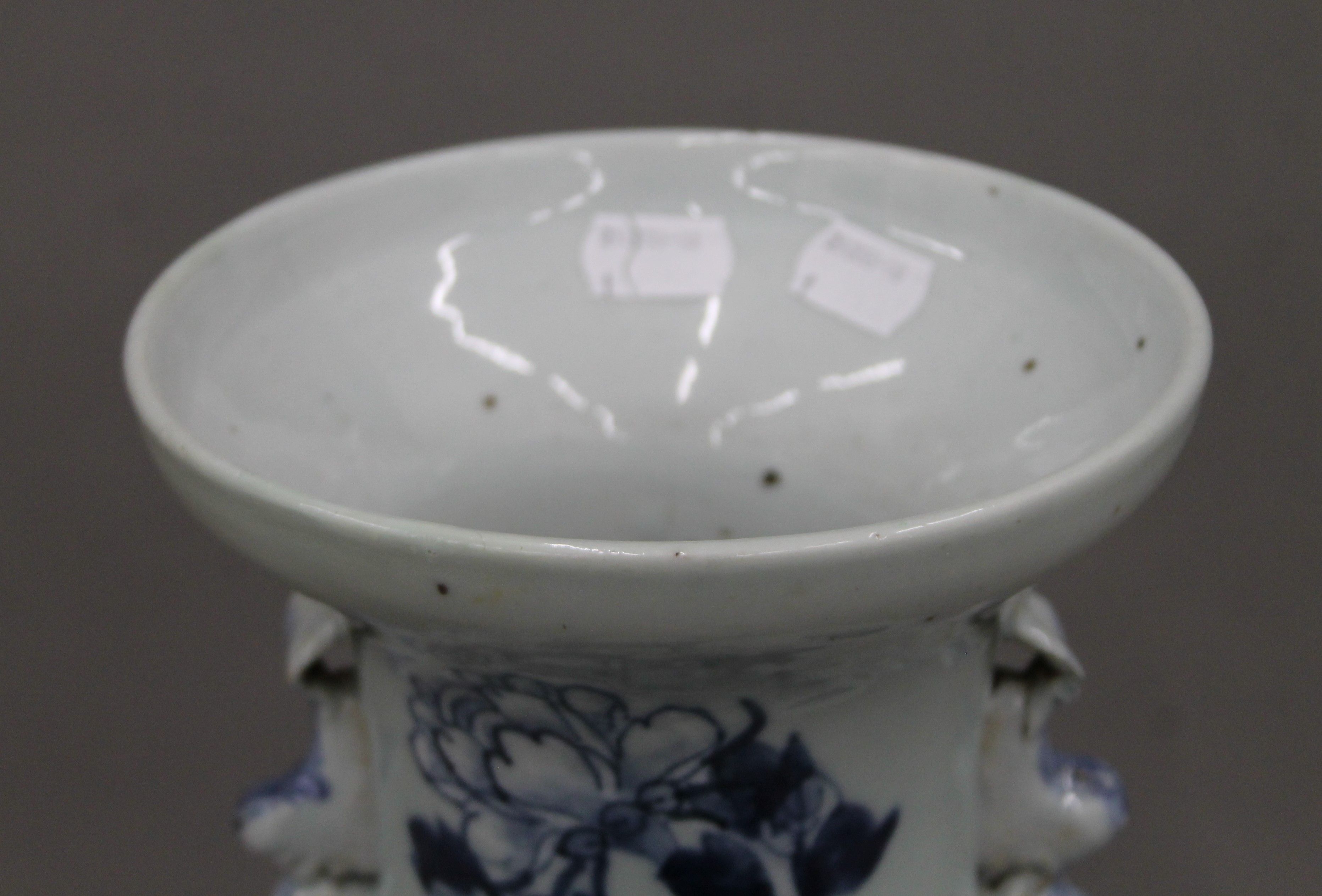 A 19th century Chinese pale celadon porcelain vase painted in underglaze blue with a bird amongst - Image 3 of 6
