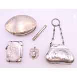 A silver vesta, a silver fob, a plated purse and a plated snuff box. Vesta 5 x 3.75 cm.