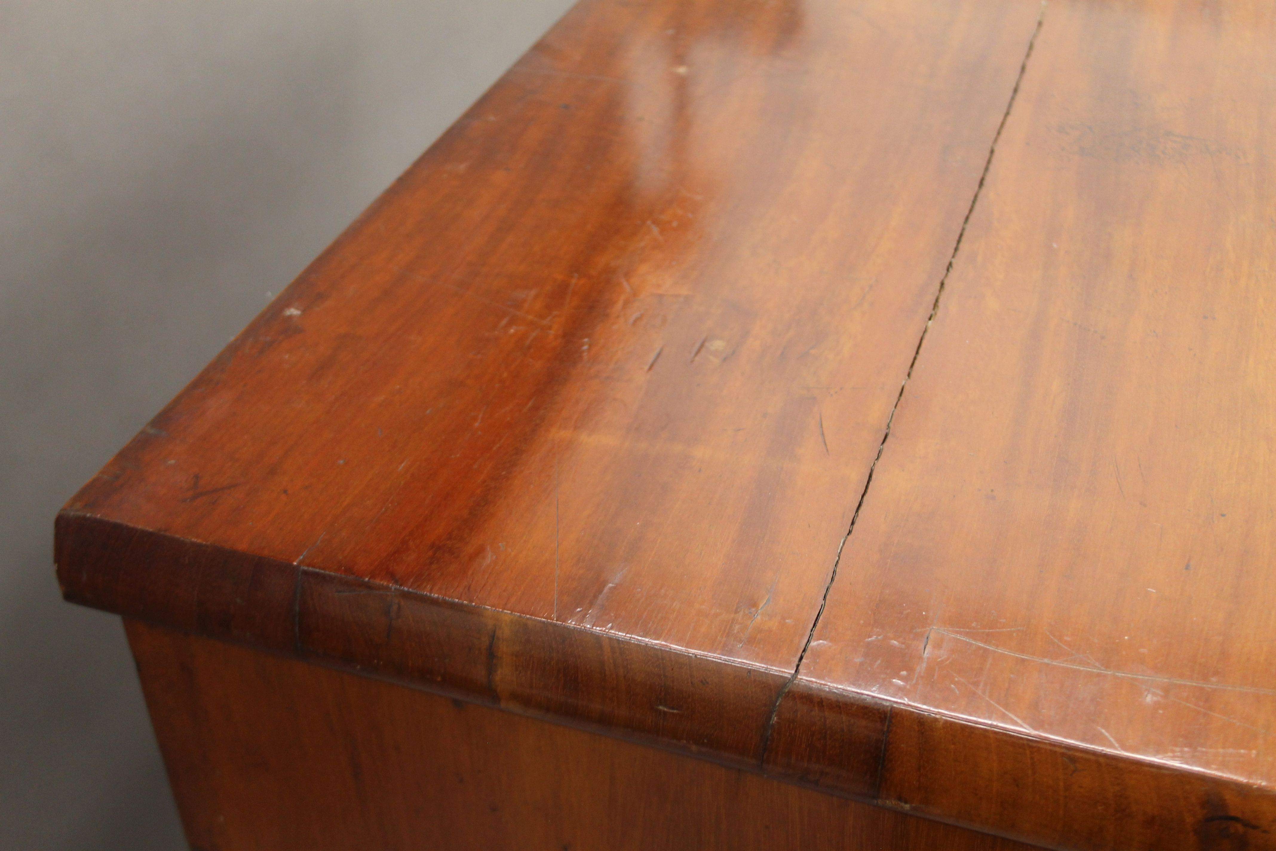 A Victorian mahogany bow front chest of drawers. - Image 8 of 9