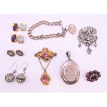 A quantity of various jewellery. Locket 4 cm high excluding suspension loop.