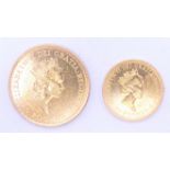A 1987 quarter ounce gold Britannia coin and a 1987 1/10 ounce gold Britannia coin. 11.9 grammes.