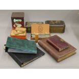 A quantity of stamps, cigarette cards, tins, etc.