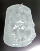 A gold mounted icy jade pendant. 5.5 cm high.