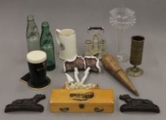 A box of miscellaneous porcelain, glass, etc. including a model of a pint of Guinness.