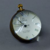 A ball clock. 6 cm high.