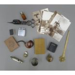 A quantity of miscellaneous items, including a scent bottle, lighters, a whistle, etc.