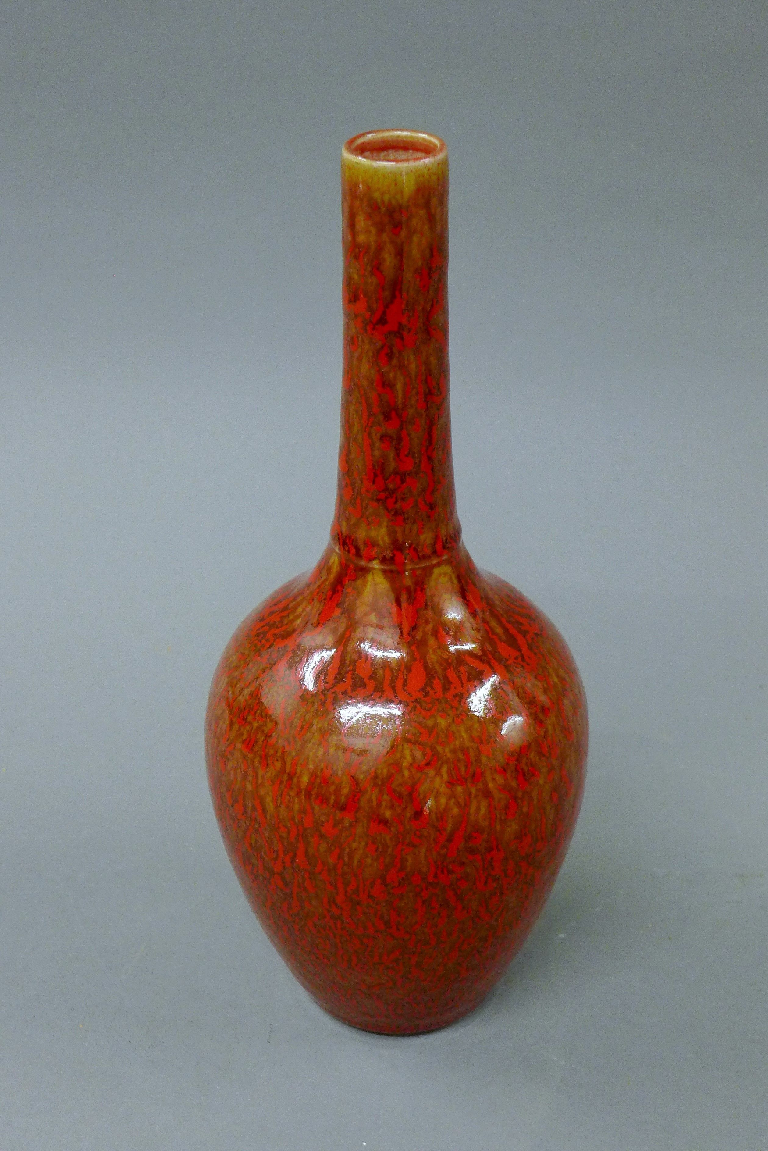 A Chinese porcelain red speckled vase. 28.5 cm high. - Image 2 of 5