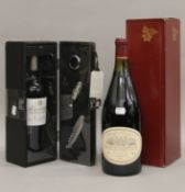 Two boxed bottles of red wine - a 2008 Revelation Cabernet-Morlet and a 1999 Domaine Filliatreau