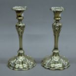 A pair of silver plated candlesticks. 23 cm high.