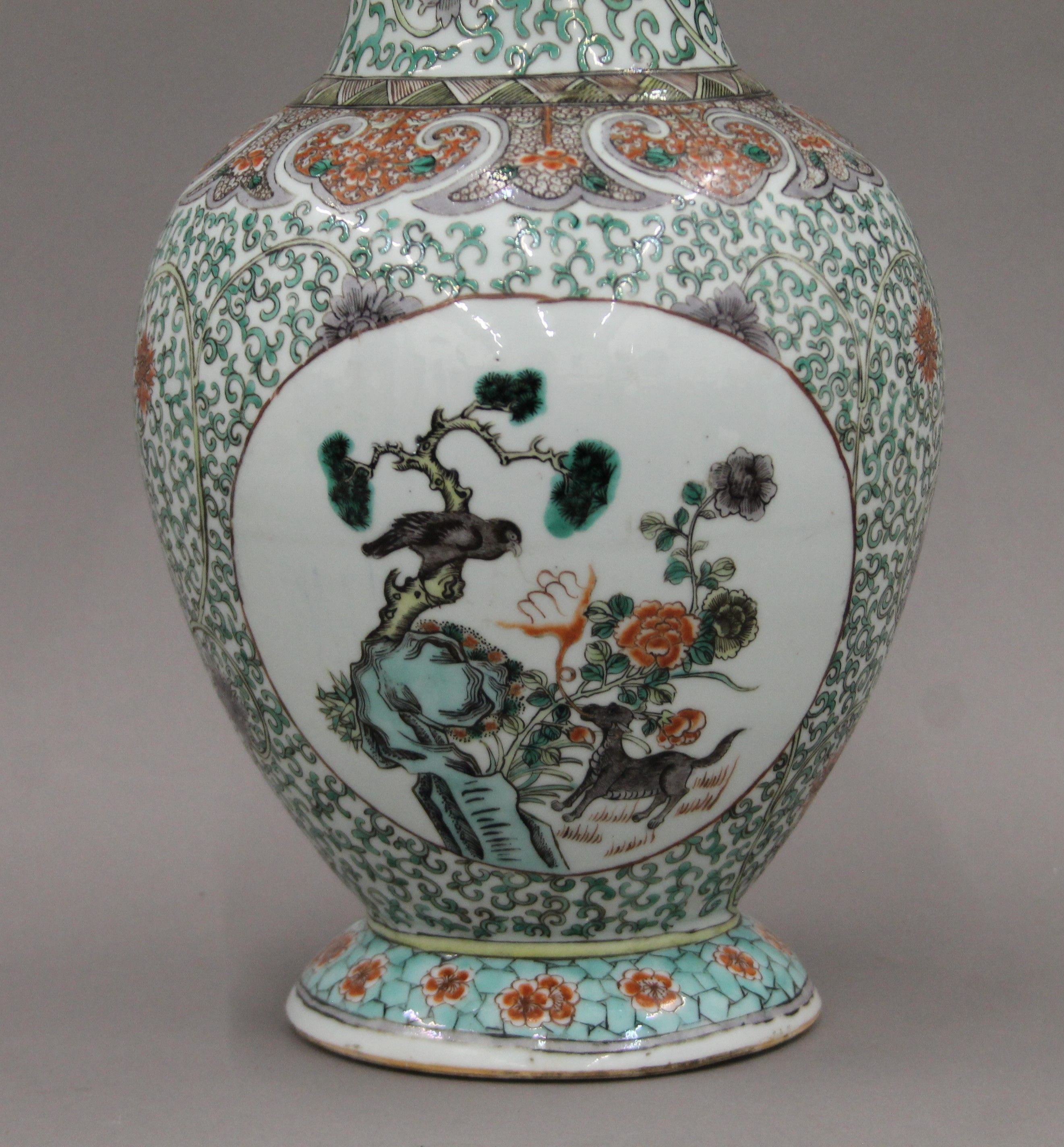 A 19th century Chinese porcelain famille verte vase with an ovoid body and flaring neck. 44 cm high. - Image 5 of 8