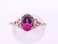 A 9 ct gold Gemporia ring. Ring size N/O. 2.1 grammes total weight.