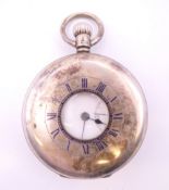 A silver J W Benson of London gentleman's half hunter pocket watch. 5 cm diameter.
