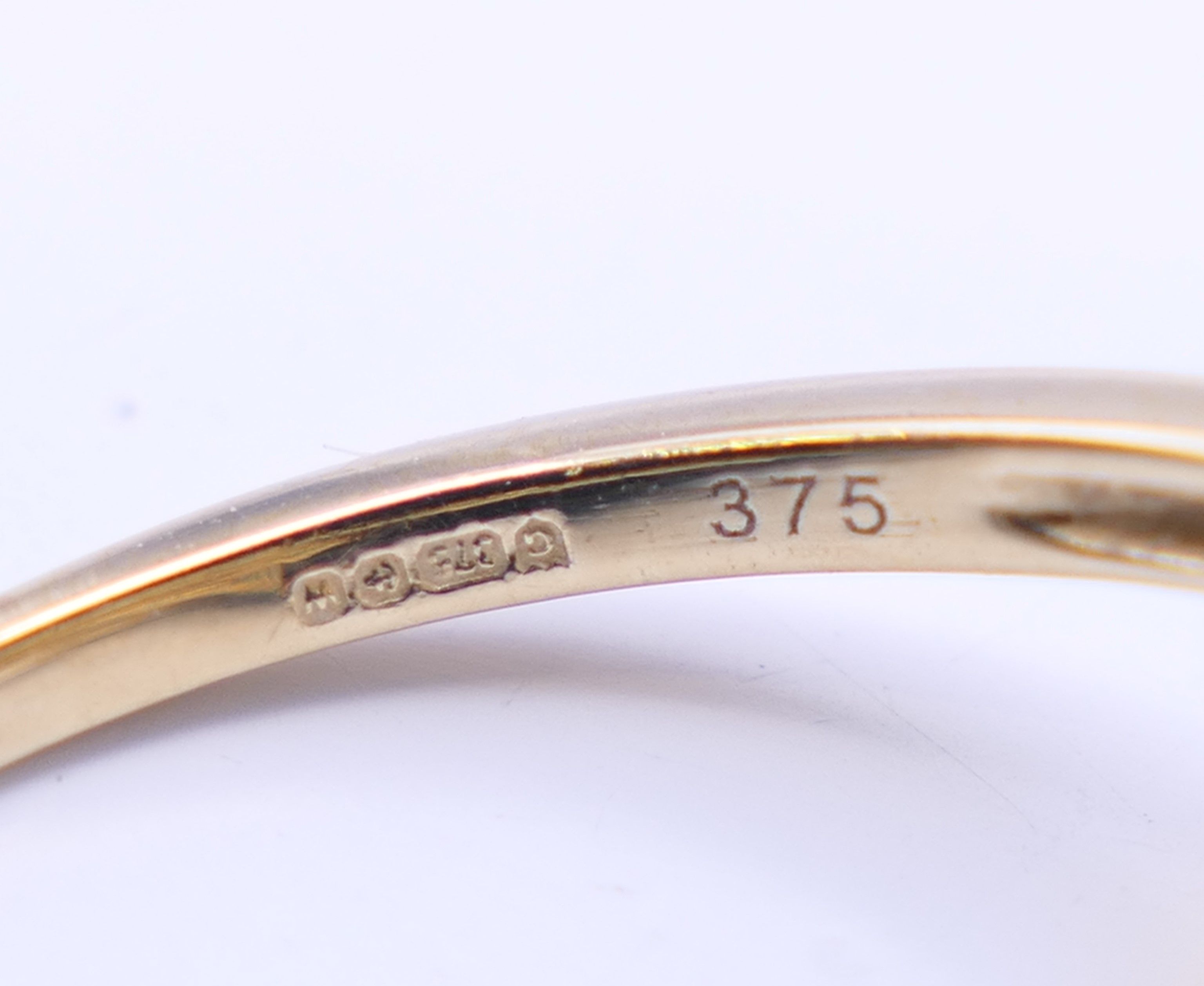 A 9 ct gold Gemporia ring. Ring size N/O. 2.5 grammes total weight. - Image 5 of 5