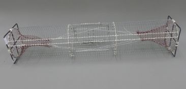 A modern eel trap. 93.5 cm long.