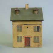 A tea caddy in the form of a house. 16 cm wide.