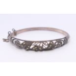 A silver bracelet. 6 cm internal diameter.