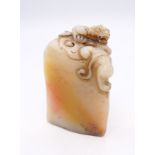 A small soapstone seal. 5.5 cm high.