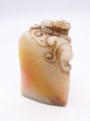 A small soapstone seal. 5.5 cm high.