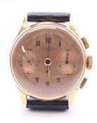 An 18 K gold cased Henchoz Fils chronograph gentleman's wristwatch. 3.5 cm wide. 36.