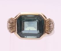 An 18 ct white gold tourmaline and diamond cocktail ring. Ring size L. 4.3 grammes total weight.