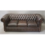 A Chesterfield settee. Approximately 190 cm wide.