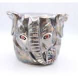 A silver cup formed as an elephant, bearing Russian marks. 7.25 cm high. 273.9 grammes total weight.