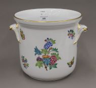 A large Herend porcelain cache pot decorated with butterflies and flowers. 20.5 cm high.