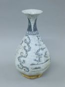 A Chinese porcelain grey and white vase. 33 cm high.