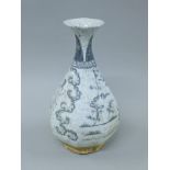 A Chinese porcelain grey and white vase. 33 cm high.