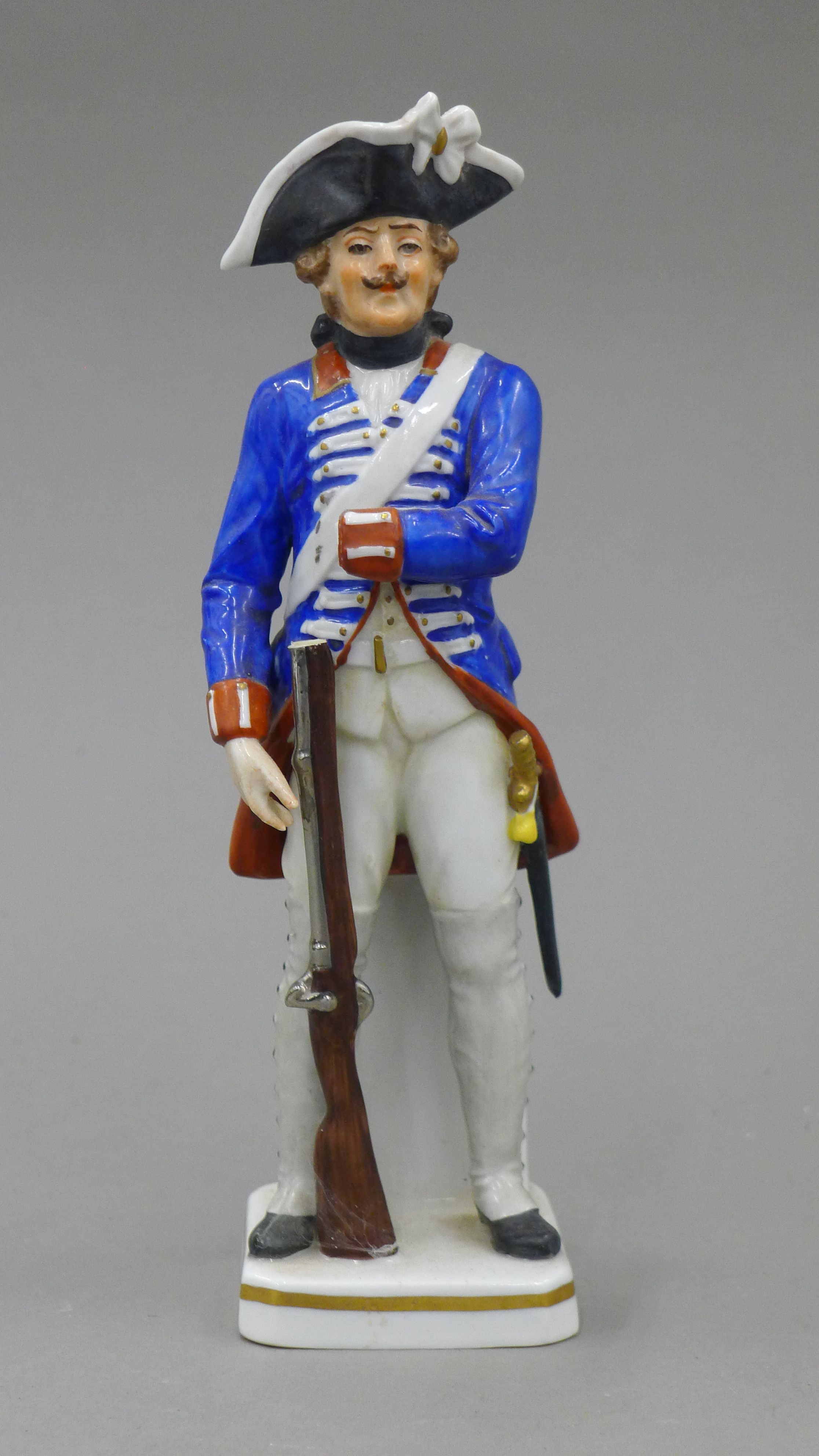 Four Continental porcelain models of soldiers. The largest 23 cm high. - Image 5 of 14