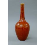 A Chinese porcelain red speckled vase. 28.5 cm high.