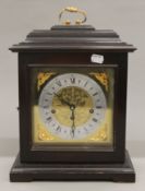 A vintage mantle clock. 37 cm high.