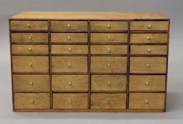 A small pine bank of drawers. 56 cm wide.