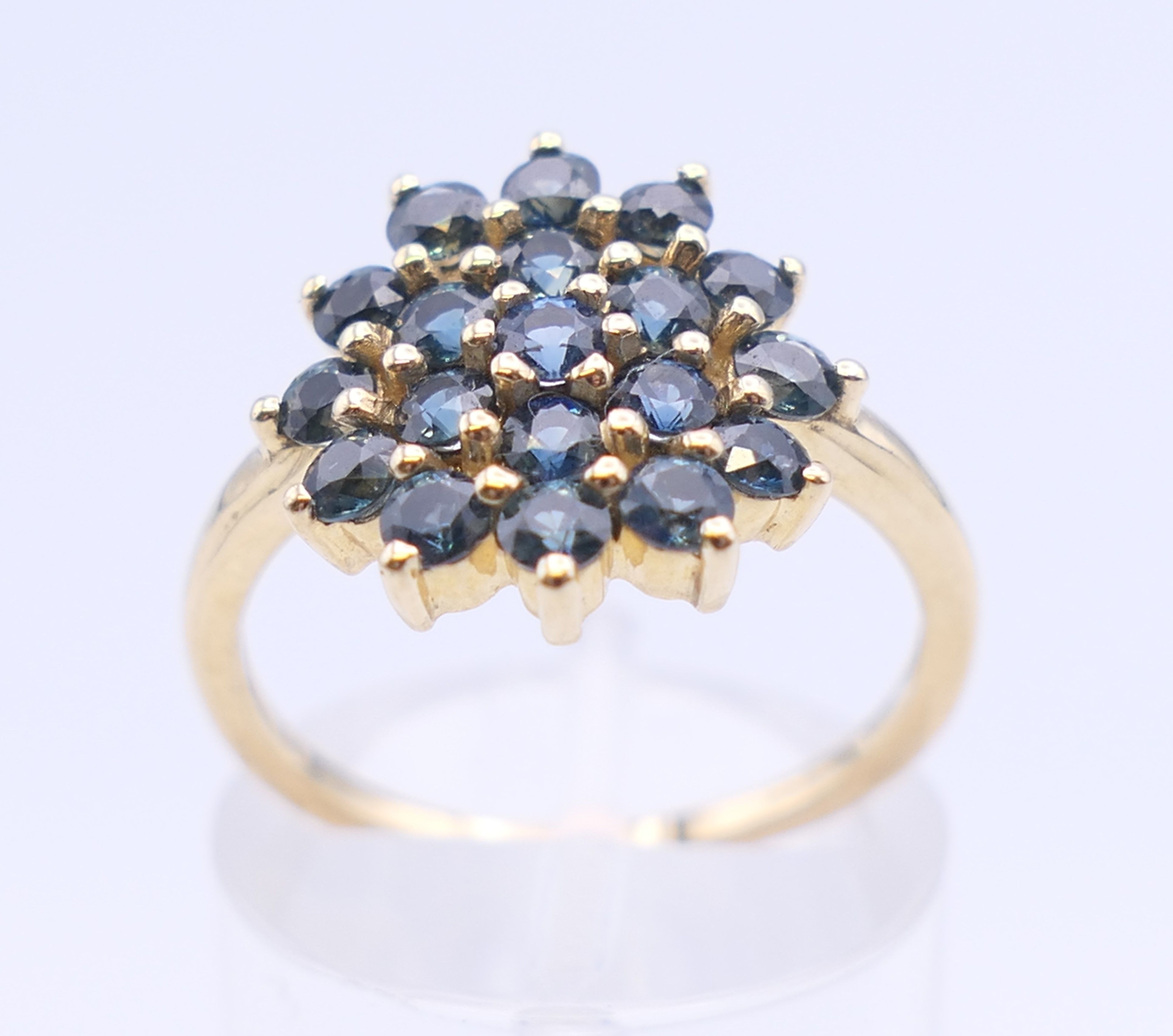 A 9 ct gold Gemporia ring. Ring size N/O. 2.5 grammes total weight. - Image 2 of 5