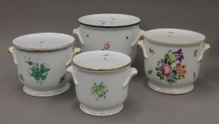 Four Herend porcelain cache pots. The largest 17 cm high.