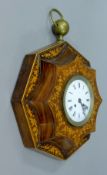 A 19th century French inlaid rosewood wall clock. 43 cm wide.