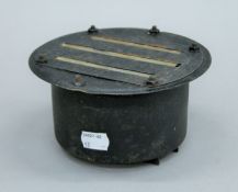 A War World II head light black out cover. 16.5 cm diameter.