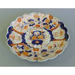 An Imari charger. 33.5 cm diameter.