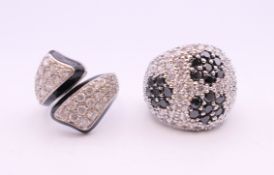 Two silver stone set rings.