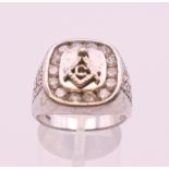 A silver Masonic ring. Ring size R.