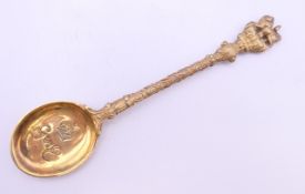 A gold plated silver spoon Coronation of George VI,
