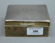 A silver cigarette box. 10.5 cm wide.
