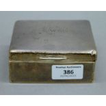 A silver cigarette box. 10.5 cm wide.