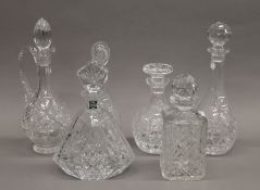 Six cut glass decanters. The largest 34 cm high.