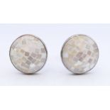 A cased pair of sterling silver and mother-of-pearl cufflinks. 1.5 cm diameter.